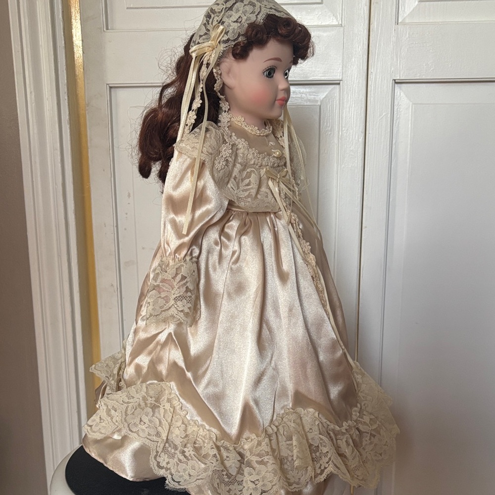 Charming Porcelain Cream Doll with Lace Accents - Picture 4 of 11